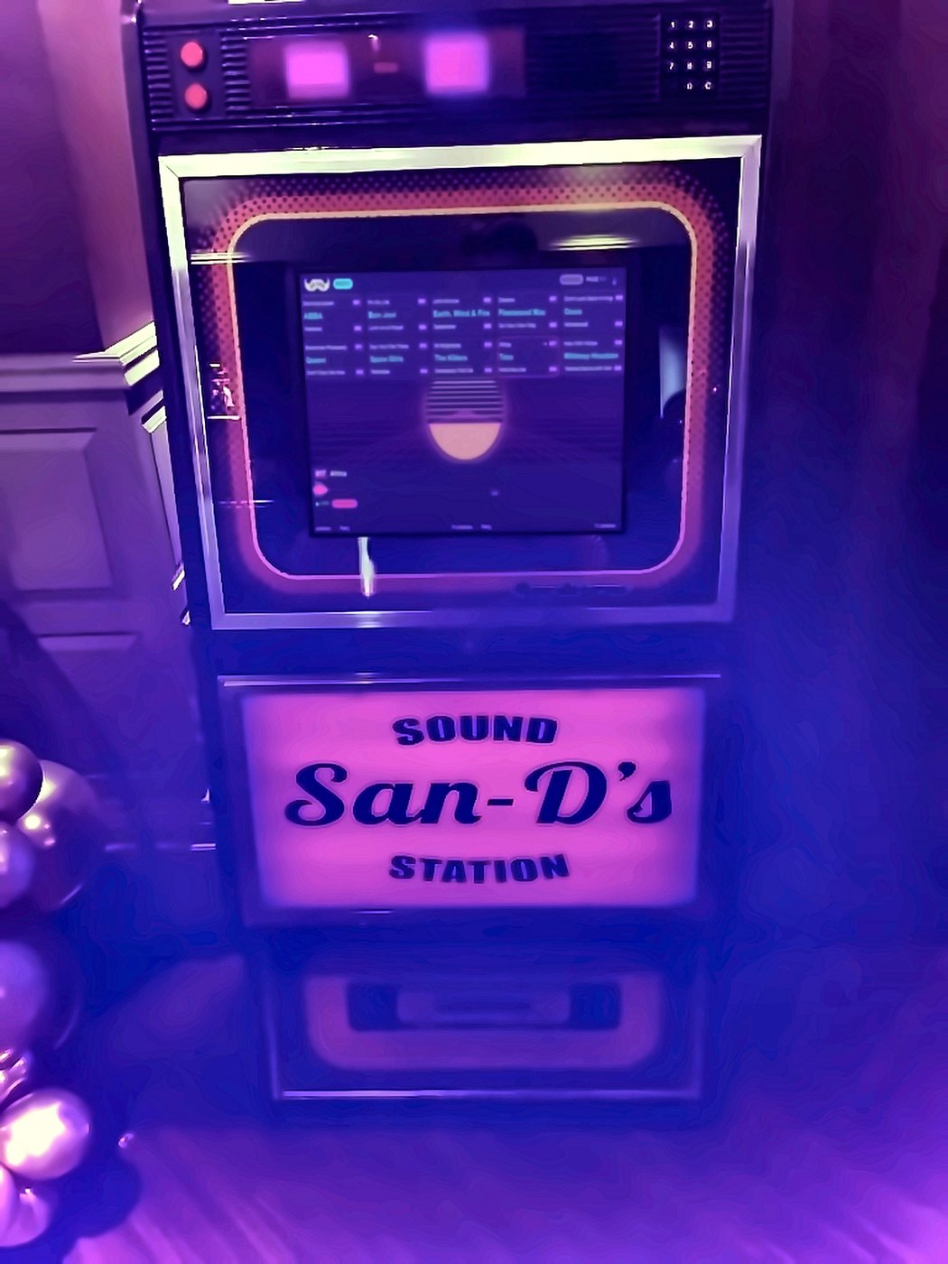 Retro jukebox hire for a private party, with a personalised San-D's Sound Station light box
